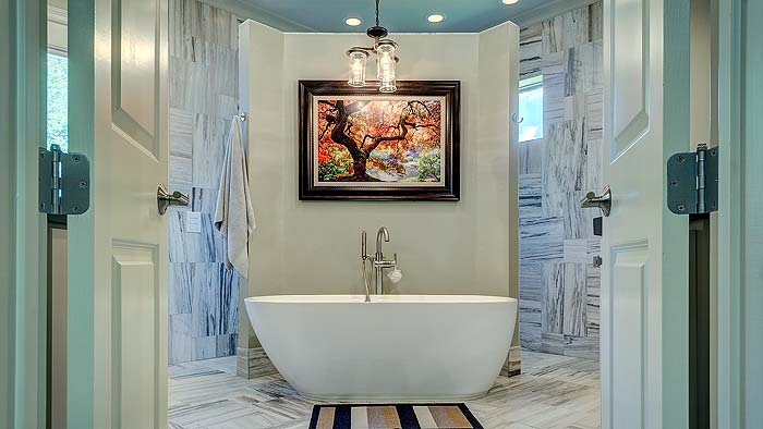 Photo of a beautiful bathroom with the perfect light fixture