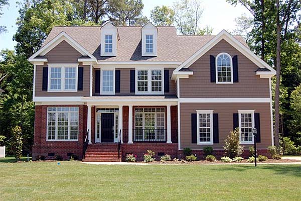 Photo of a new home with lots of windows