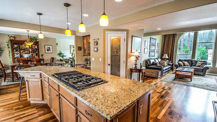 Photo of a kitchen with three pendant light fixtures over the island